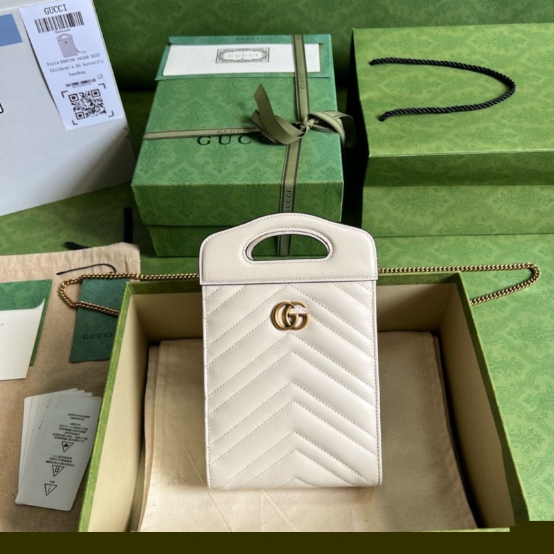 G*u*i top handle bags